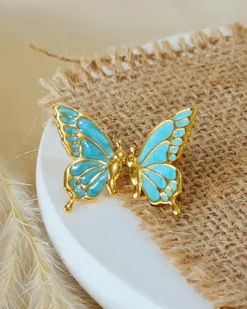 Mariposa Dorada Celeste